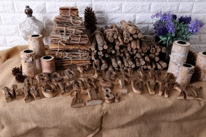 Detail of natural birch wood alphabet letters and numbers on rustic burlap background