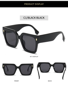 Détails de lunettes de soleil carrées noires avec monture large et clous dorés