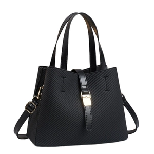 Modern black tote bag with diagonal embossed PU leather and gold metal buckle hardware