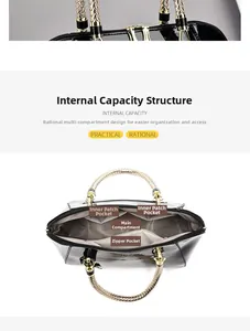 Detail view of the black patent leather handbag interior and gold braided handle texture