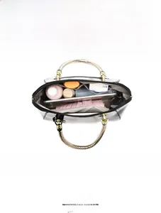 Spacious tote bag interior with compartments showing storage for tablet and umbrella