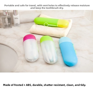 Detail view of ventilated candy-colored travel toothbrush cases on a bathroom countertop