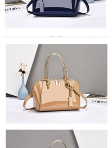 Close-up of beige patent leather tote bag featuring woven gold handles and metallic hardware