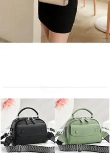 Detail of lychee pattern leather handbags with geometric straps in black and light green
