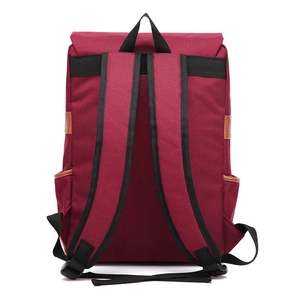 Rear view of burgundy canvas backpack with black adjustable straps and leather trim accents