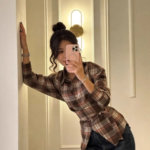 Brown plaid long sleeve shirt with waist tie and tartan pattern for casual style