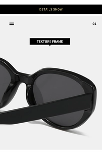 Macro detail of the wide textured frame and sturdy temples of these black cat eye sunglasses