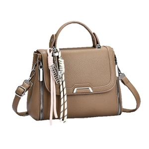 Brown litchi grain leather handbag for women with silver metal bar and abacus charm