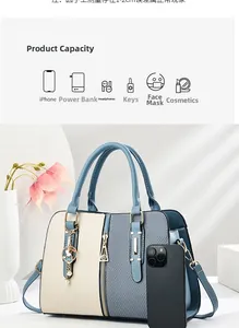 Vue détaillée du sac tissé montrant la capacité pour téléphone, batterie externe et clés