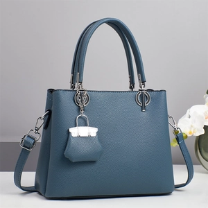 Blue lychee leather handbag with double round handles and silver hardware accessories