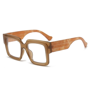 Fashionable oversized square blue light blocking glasses with amber frames and marble temples