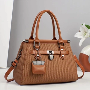 Elegant brown woven texture shoulder bag for women with silver hardware and pendant