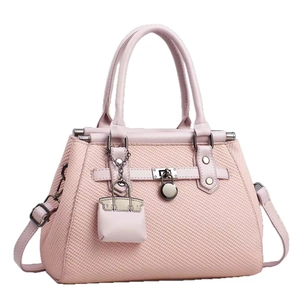 Pink woven texture shoulder handbag for women with smooth leather handles and mini charm