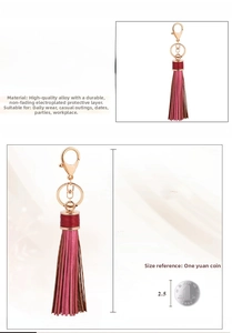 Close-up of leather tassel keychain measuring 20cm with rose gold alloy clasp