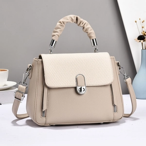 Elegant beige crossbody bag with textured weaving and leather finish for women
