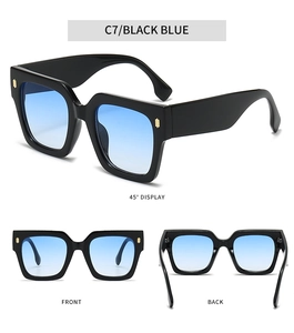 Vues détaillées de lunettes de soleil carrées avec accents dorés et verres dégradés bleus