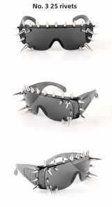 Detail of punk sunglasses featuring translucent grey lenses and 25 silver metal rivets