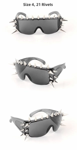 Macro detail of punk rock shield sunglasses with silver metal rivets and black lens