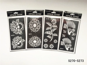 Détail de quatre pochoirs de tatouage au henné avec motifs mandalas floraux élégants