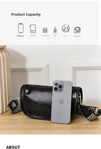 Dettaglio della capacità della borsa a cilindro nera per telefono e accessori