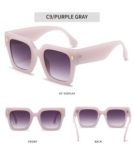 Détail des verres dégradés violet gris et des accents métalliques dorés sur monture rose