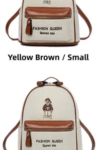 Detail of canvas backpack featuring bear embroidery and premium faux leather accents