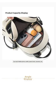 Internal view of cream canvas backpack showing capacity for phone wallet and umbrella