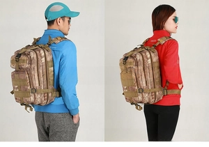 Detail of digital camouflage tactical backpack featuring MOLLE system for hiking