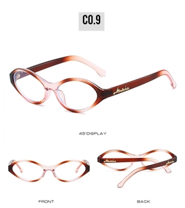 Detail view of pink cat-eye sunglasses with gold logo on temple and gradient finish