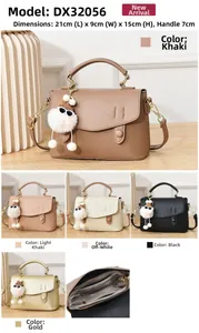 Détails du sac bandoulière femme avec dimensions 21x9x15cm et compartiment intérieur zippé