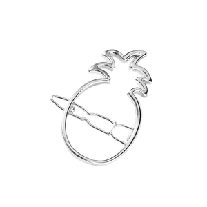 Modern minimalist silver hollow pineapple hair clip on a clean white background