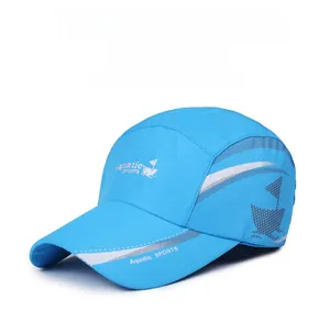 Detail of blue quick-dry sports cap with breathable mesh holes and Aquatic SPORTS logo
