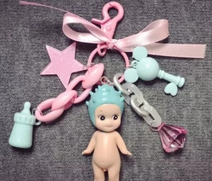 DIY colorful keychain with baby doll, pink bow and mint green bottle accessories