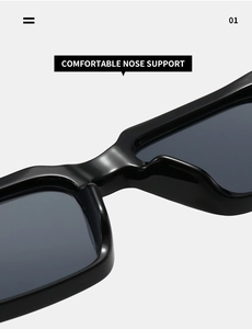 Close-up of comfortable integrated nose pads on glossy black square sunglasses frames