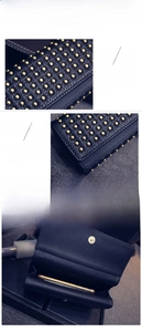 Detail view of navy rivet clutch showing gold studs, durable stitching, and phone compartment