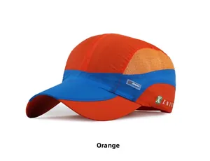 Breathable orange mesh side panel on blue quick-dry sports cap with X-ENIUM logo