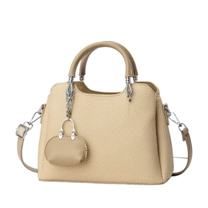 Beige woven handbag with matching mini pouch and adjustable brown leather straps