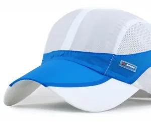 Detail of breathable white mesh and blue fabric panel with W SPORT logo on baseball cap
