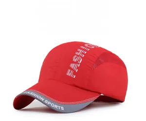 Detail of red quick-dry baseball cap with breathable mesh and Fashion Sports text