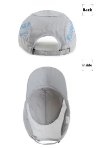 Detail of gray quick-dry baseball cap featuring breathable mesh and adjustable metal buckle