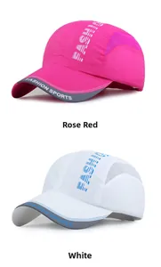 Detail of rose red and white baseball caps with breathable side mesh and sports lettering