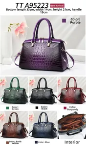Detail of crocodile pattern crossbody bag showing colors, internal compartments and dimensions