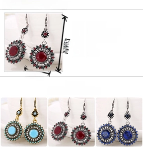 Detail view of Bohemian sunflower earrings with resin stones and size specifications