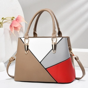 Luxury colorblock geometric handbag in khaki and red with gold hardware and shoulder strap