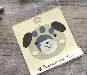 Detail of translucent cookie bag featuring cute cartoon dog and Thank You text