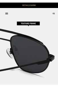 Detail view of black aviator sunglasses with textured metal frame and clear nose pads