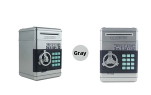 Detail view of the gray electronic ATM piggy bank with digital keypad and rotary handle
