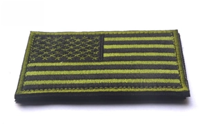 Detailed embroidery on olive green and black tactical USA flag patch with hook backing