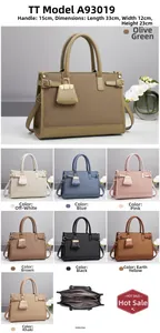 Detailed view of women's woven handbag dimensions showing 33cm length and internal layers