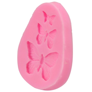 Pink egg-shaped silicone fondant mold with three butterfly patterns for DIY cake baking